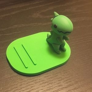 FREE WITH PURCHASE - Cute dinosaur cell phone stand